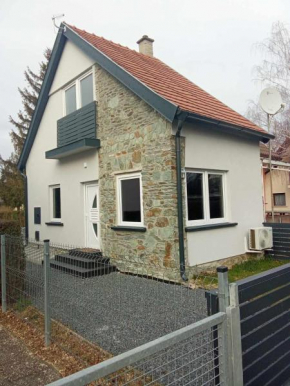 Szarkaláb Apartman